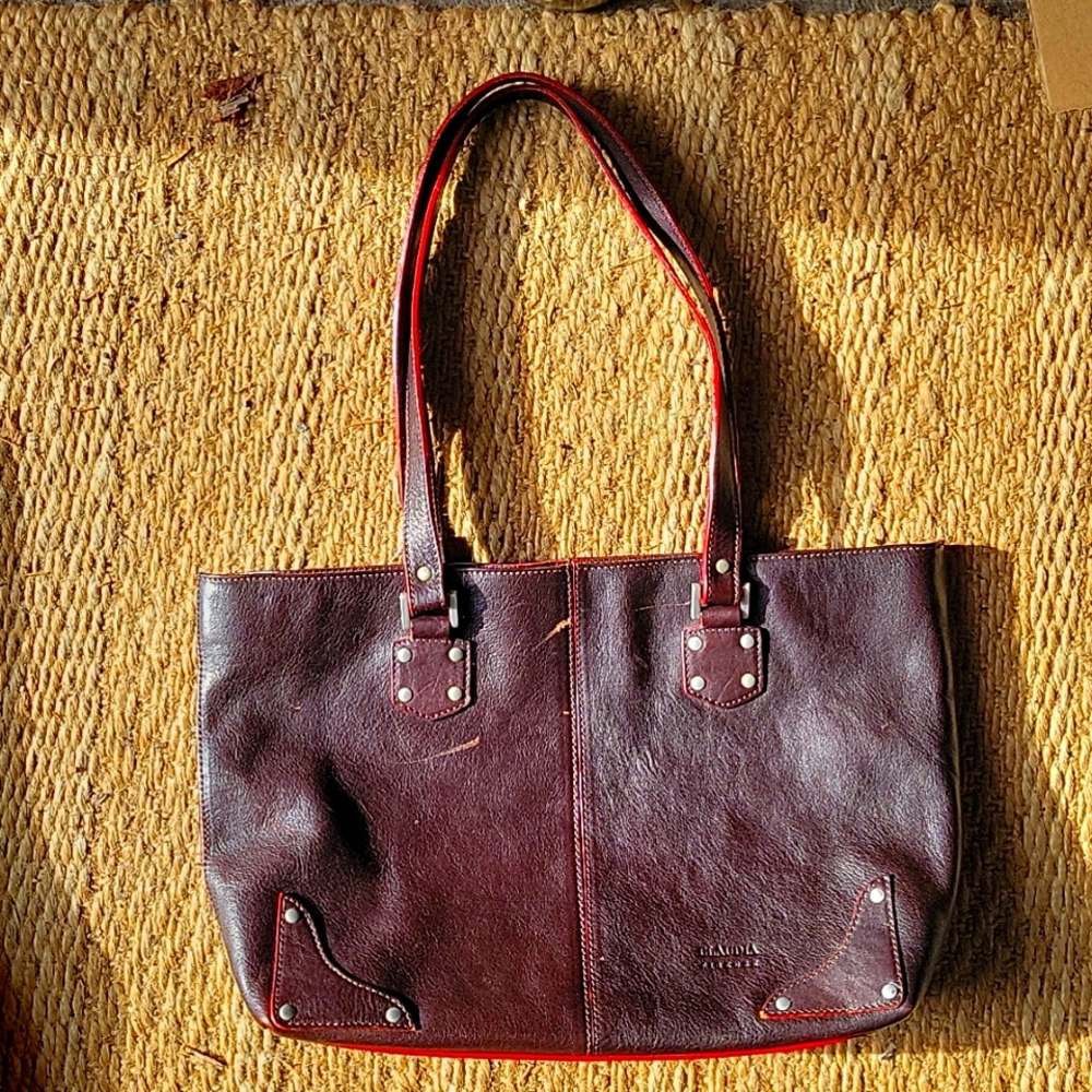 Claudia Firenze Italian Leather Purse brown leather with red lining.